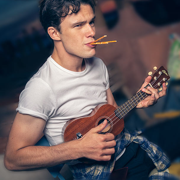 The blur feature represented with a picture of a guy playing music